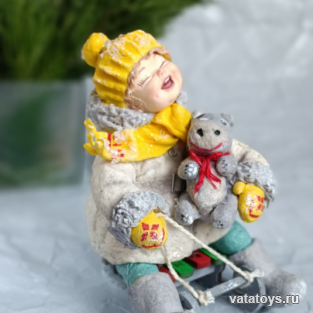 Девочка на саночках